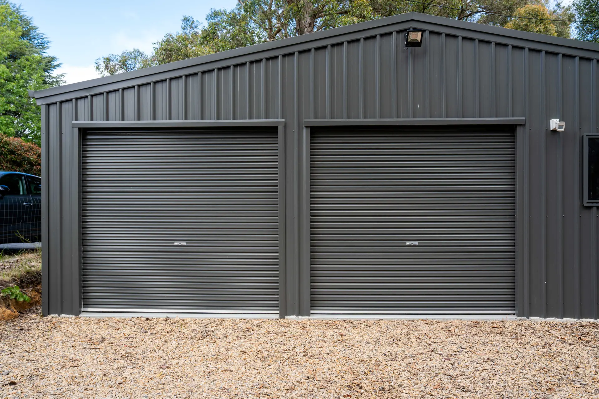 Woodland Grey car shed with double roller doors