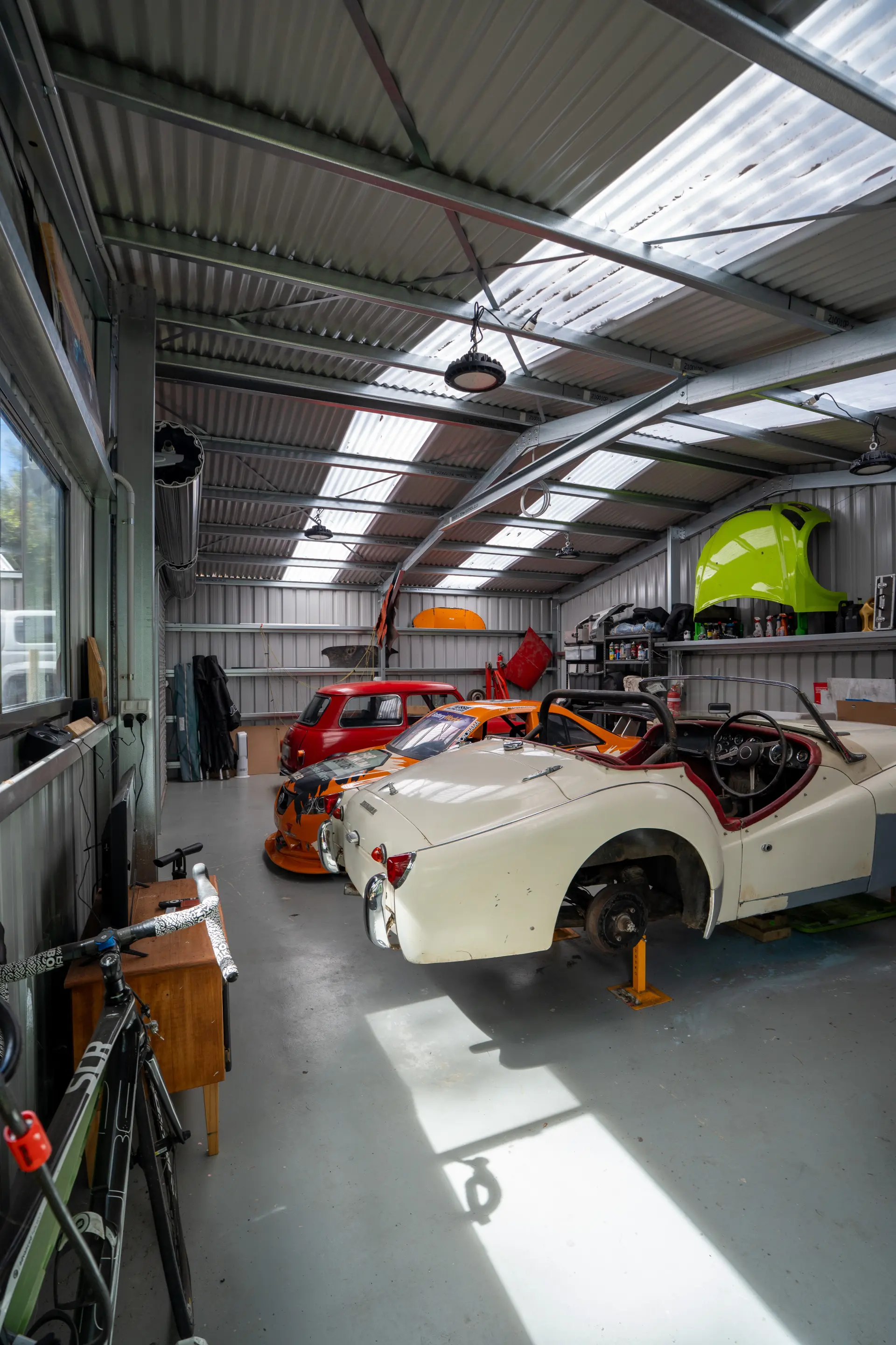 Interior of car storage shed with skylights