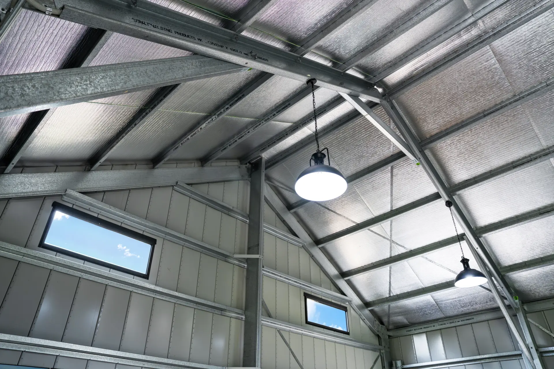 Interior roof framing of barn door shed