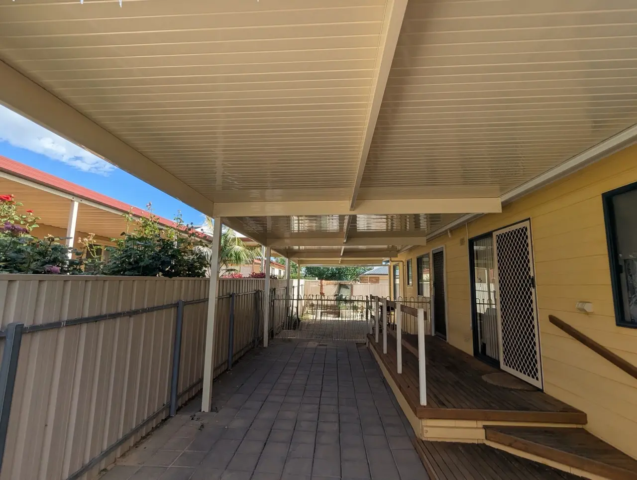 Sunset decking flat roof attached carport Large