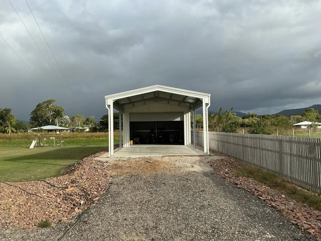 Front view of gable shed with carport