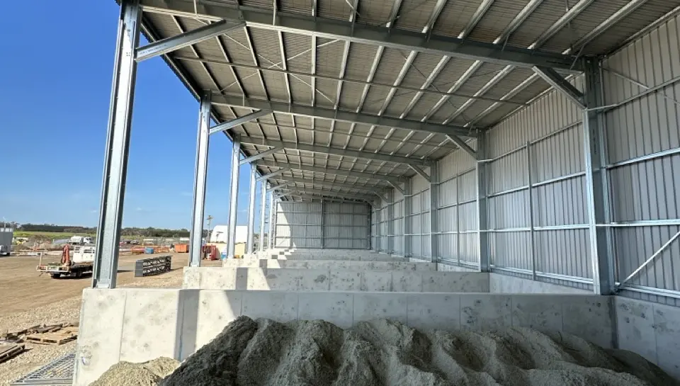 Interior of commercial shed with concrete bunker bays
