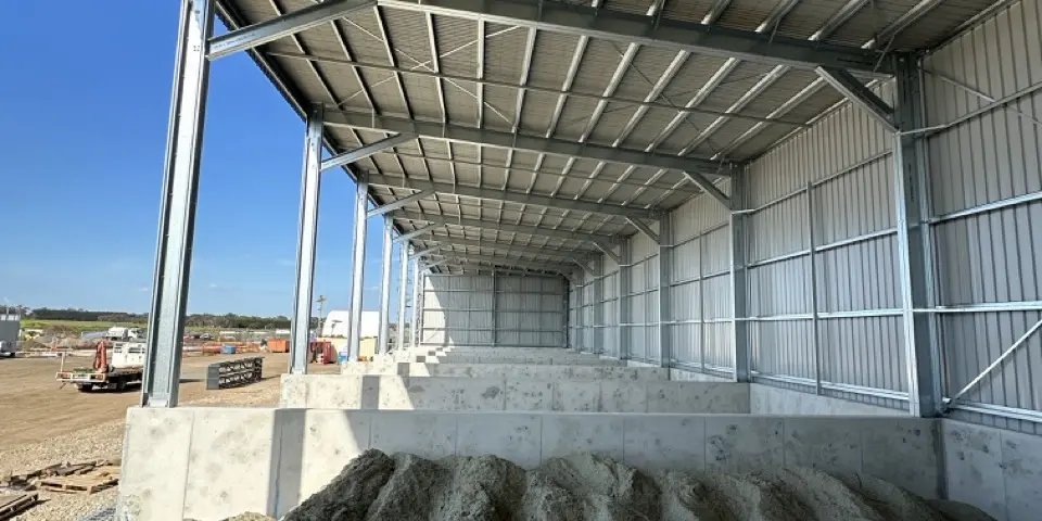 Interior of commercial shed with concrete bunker bays
