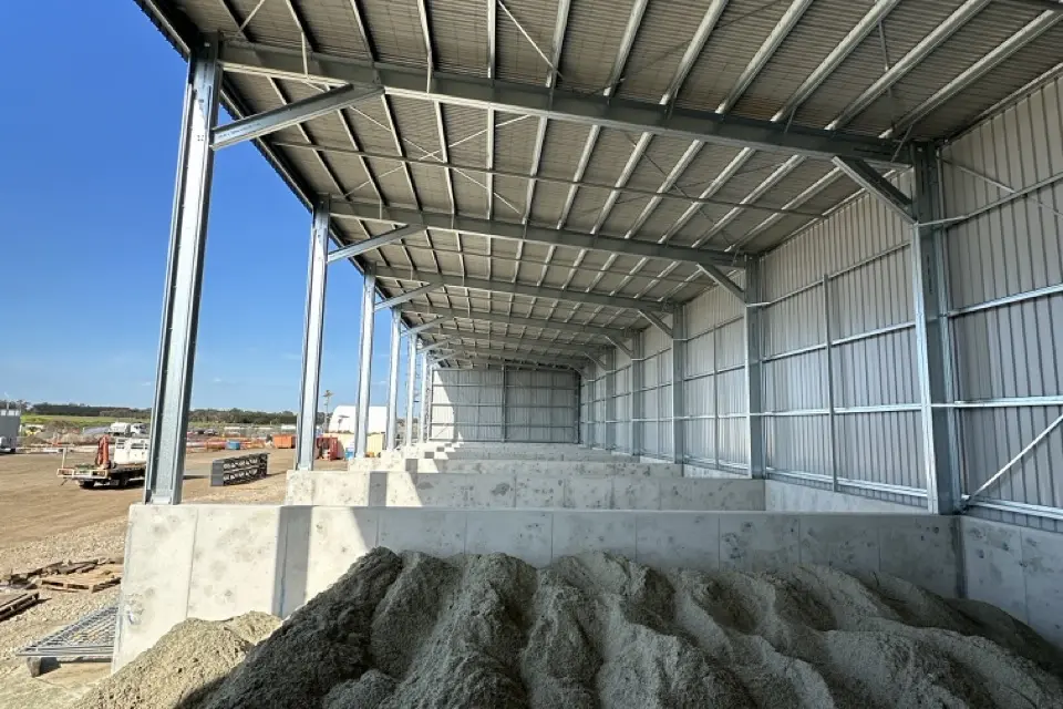 Interior of commercial shed with concrete bunker bays